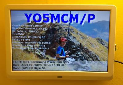 digital picture frame showing an eQSL card